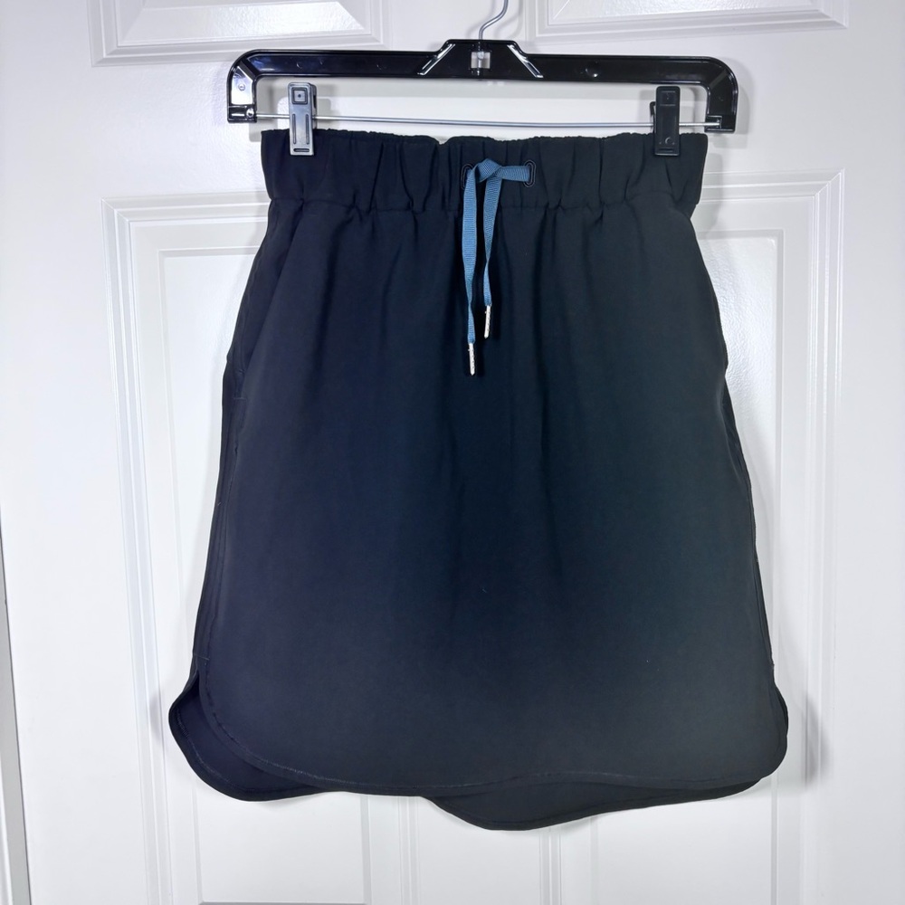 Lululemon On The Fly Woven Pull On Skirt Women’s 4 Travel Pockets Drawstring